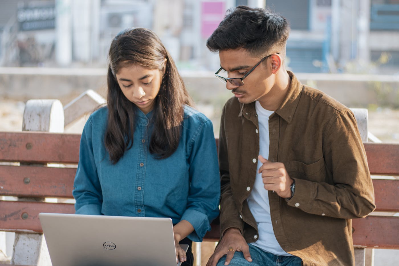 Indian students using a laptop to prepare a Global Korea Scholarship application