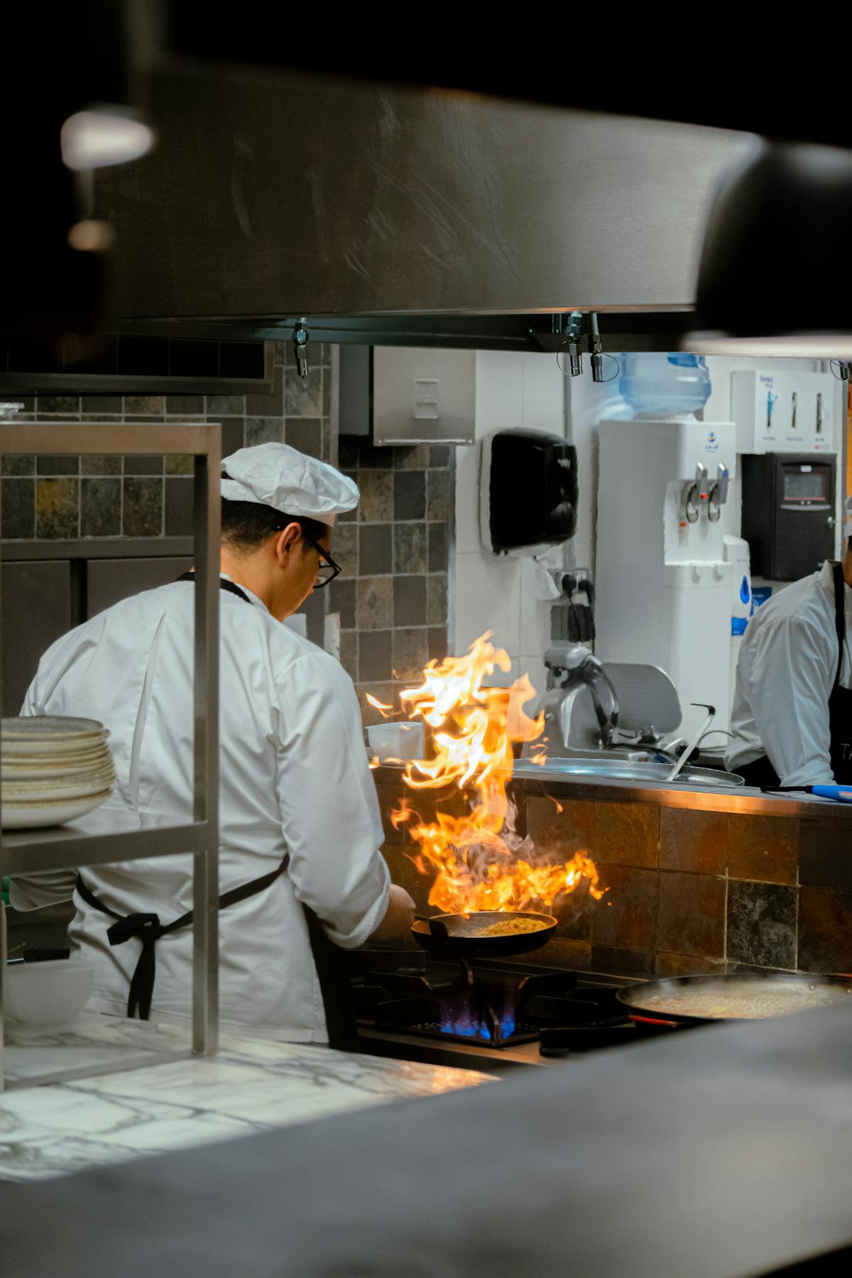 Indian chef apostille attestation: chef plating a tasting course at a Michelin-starred restaurant
