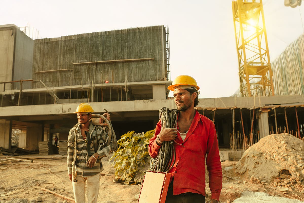 Indian construction workers on a Saudi NEOM mega-project site whose engineering degree and ITI certificate need MEA