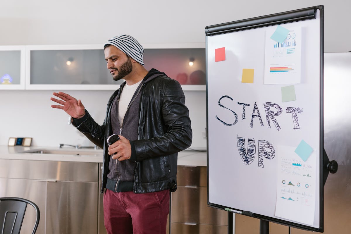 Indian founder presenting at a startup pitch in Silicon Valley