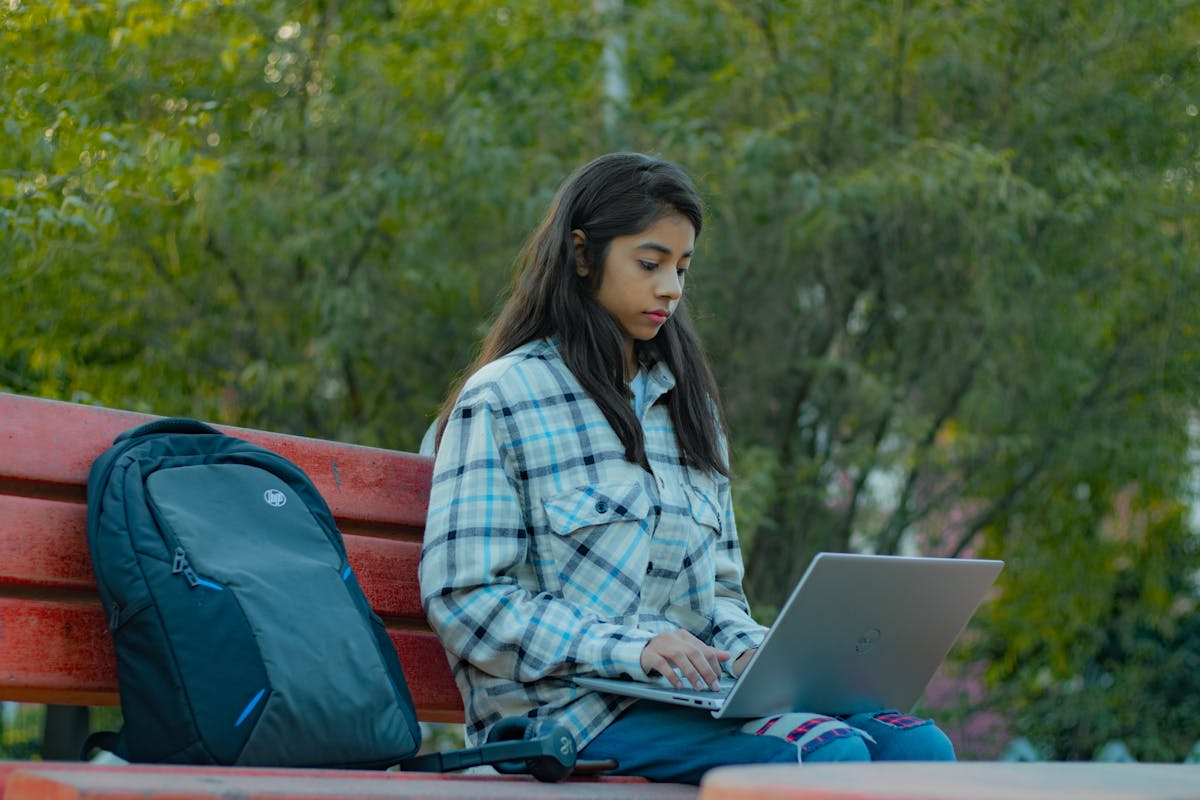 Indian student walking through a Bratislava university campus before a Slovakia apostille and Slovak translation file