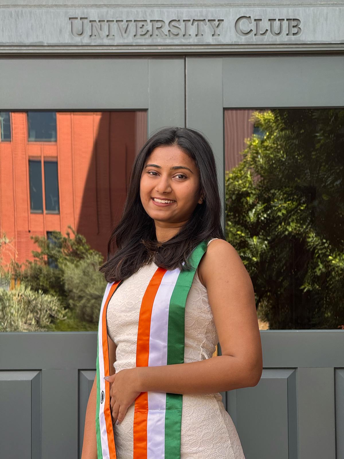 Indian woman student walking through a UK university campus