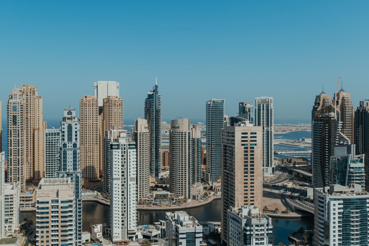 Indian-origin senior executive at a Dubai office overlooking the city skyline