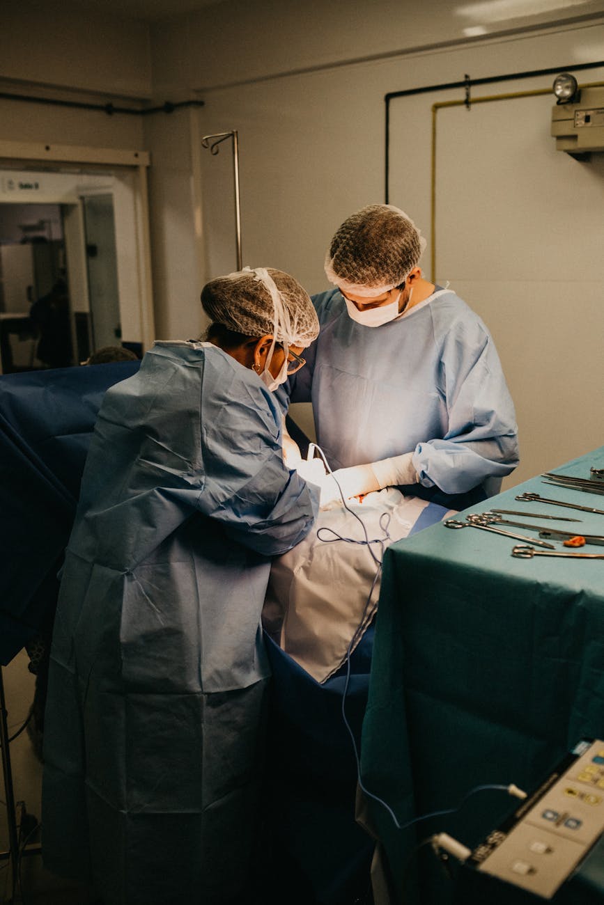 Indian nurse checking documents and a verification screen for DataFlow status