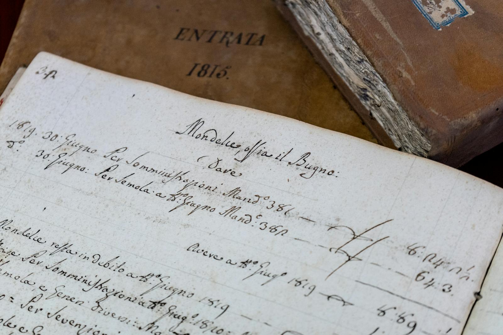 Italian script beside translated documents