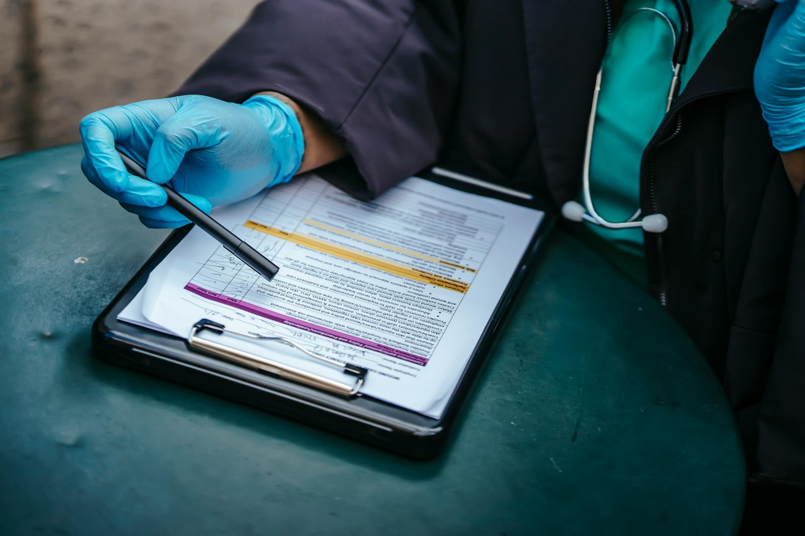 Medical documents being reviewed for visa, translation and attestation requirements